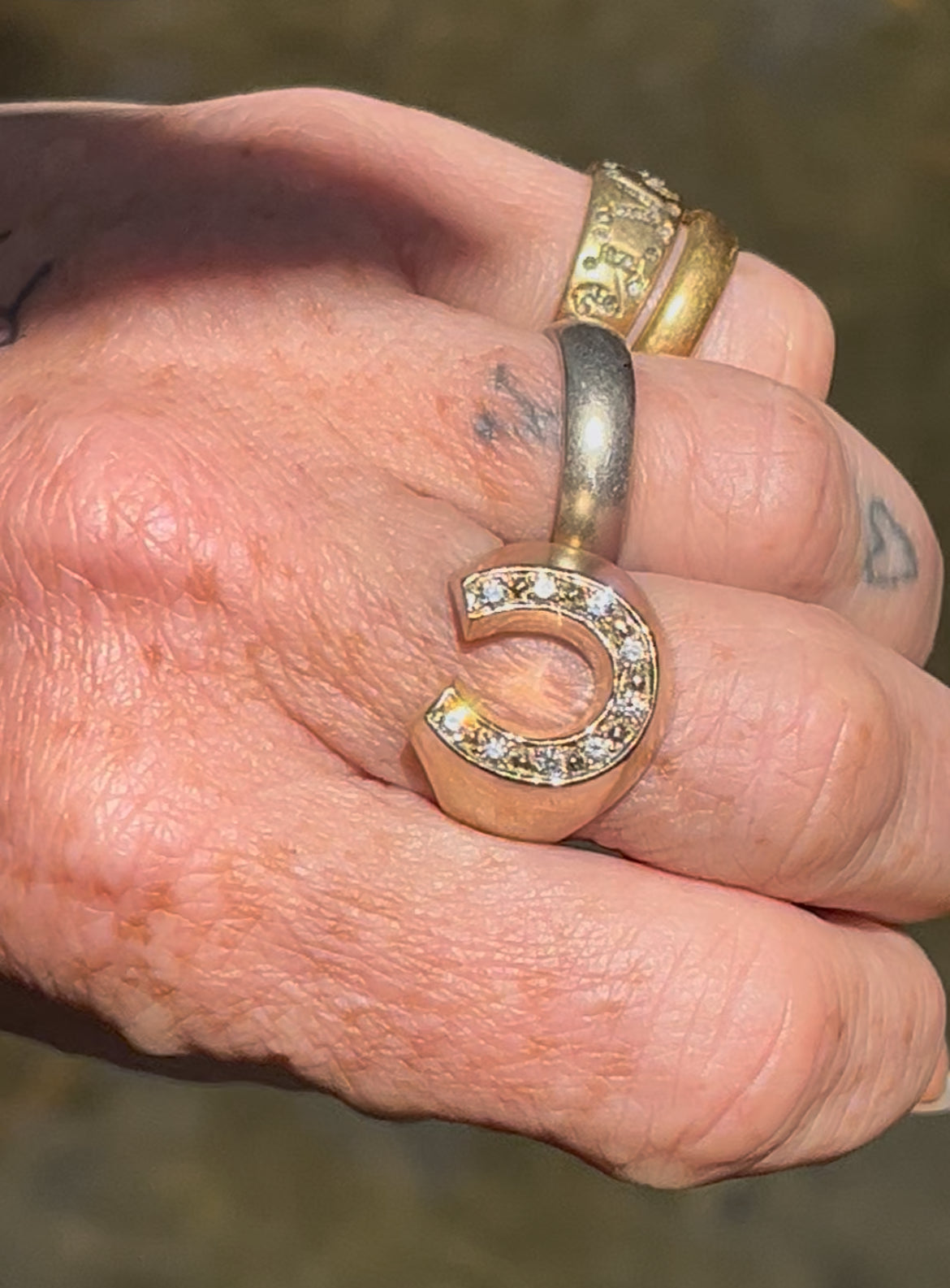 Diamond and 14k horseshoe ring