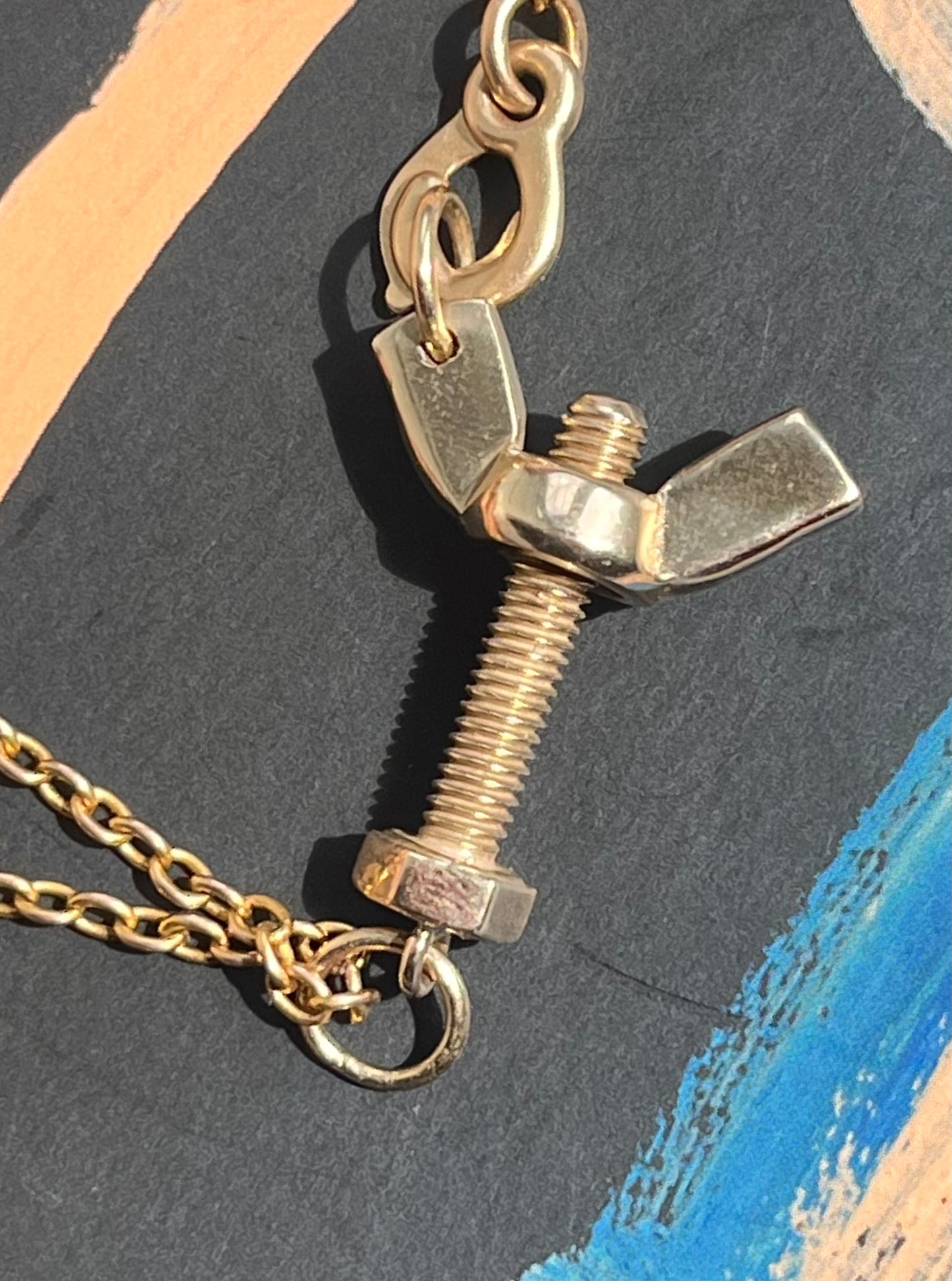 "Be the wingnut to my bolt" in 14k yellow gold