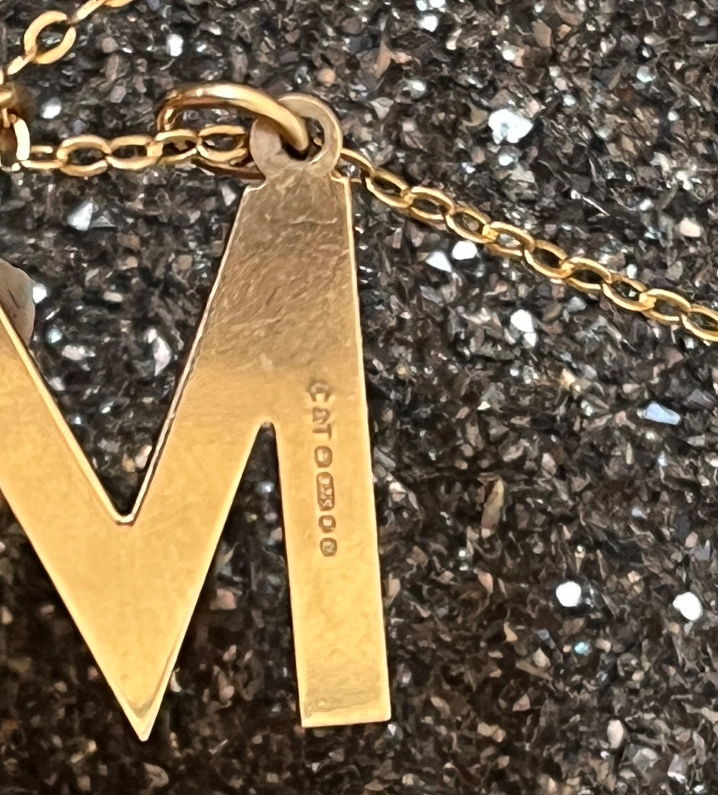 M pendant
