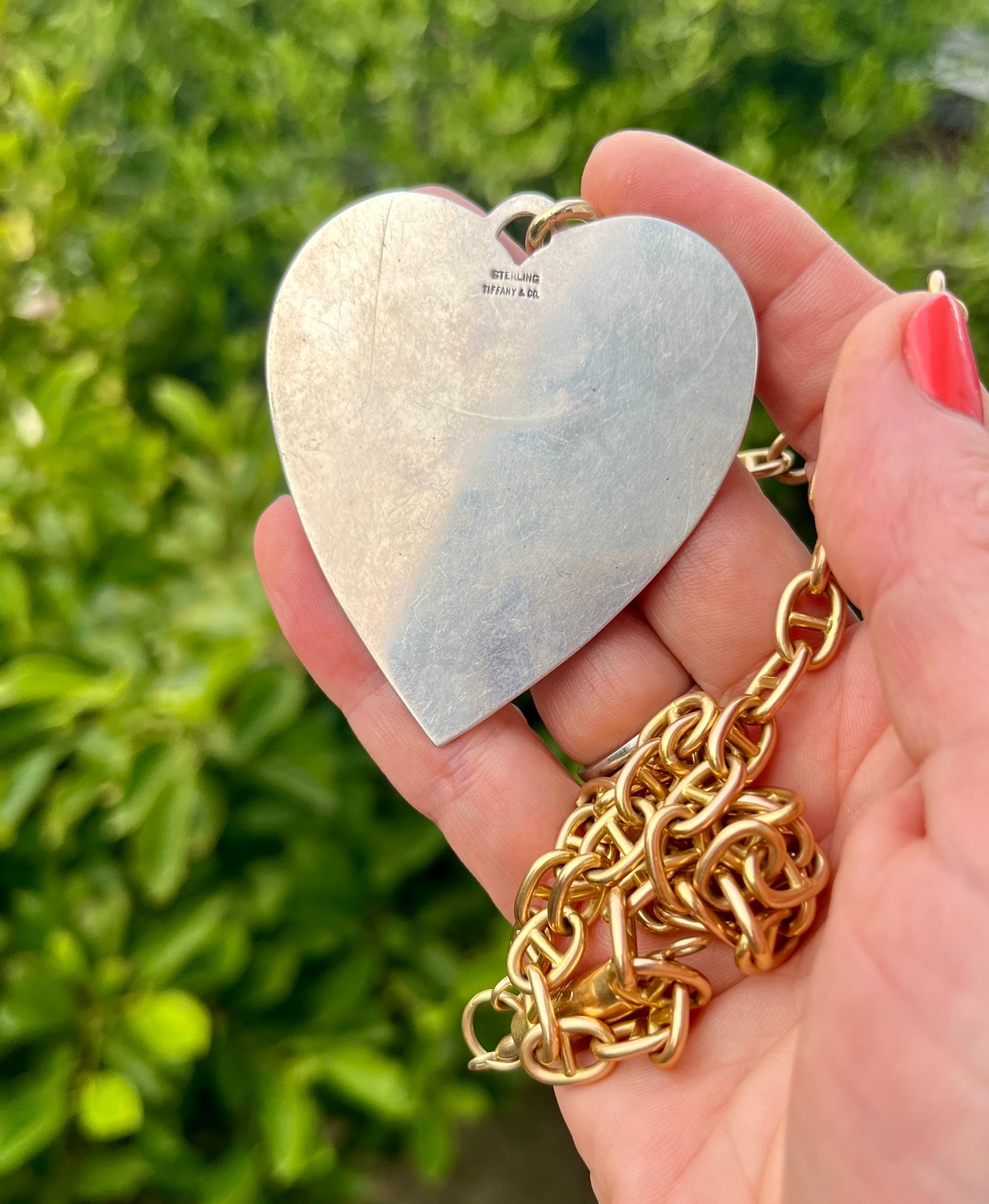 large, vintage sterling silver Tiffany and Co heart pendant