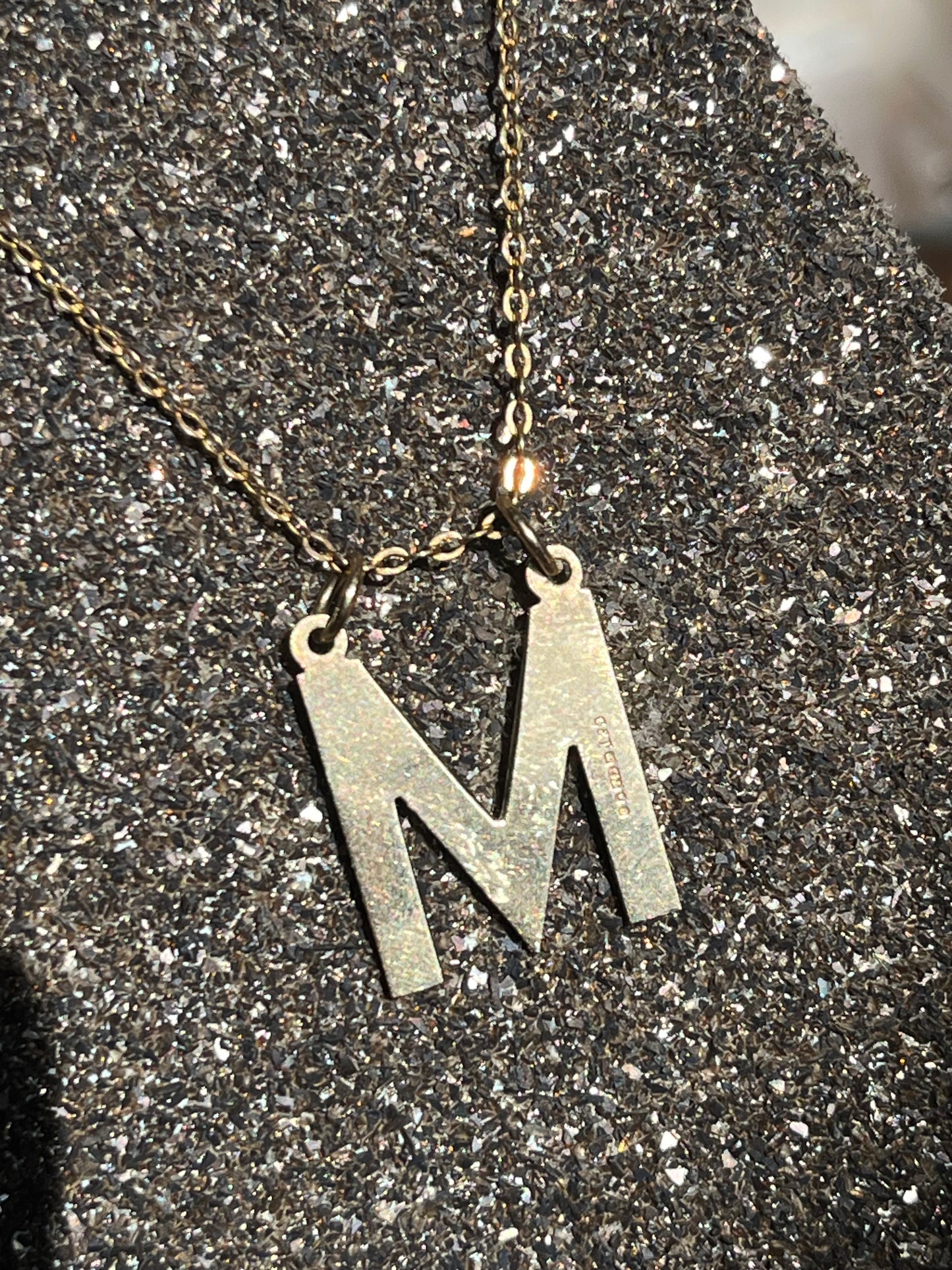 M pendant