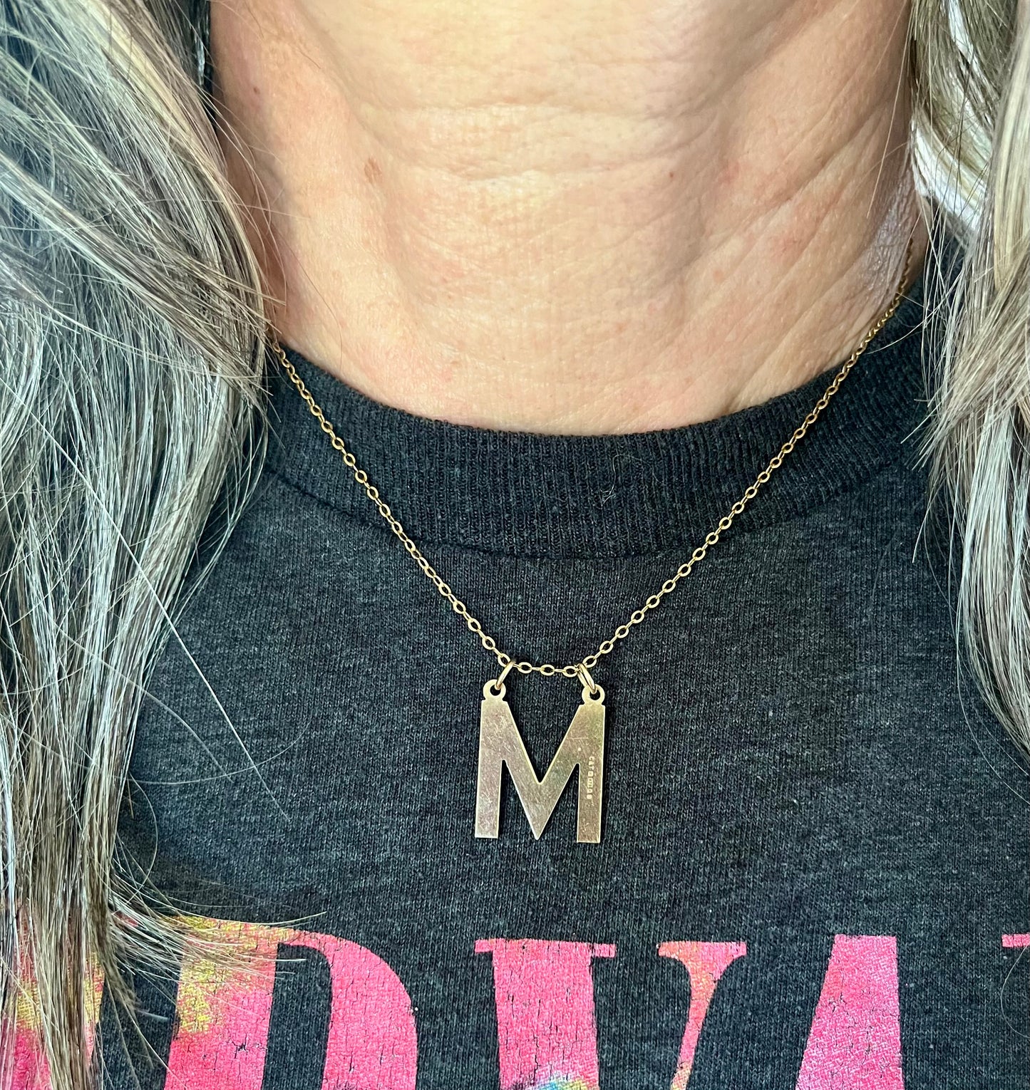 M pendant