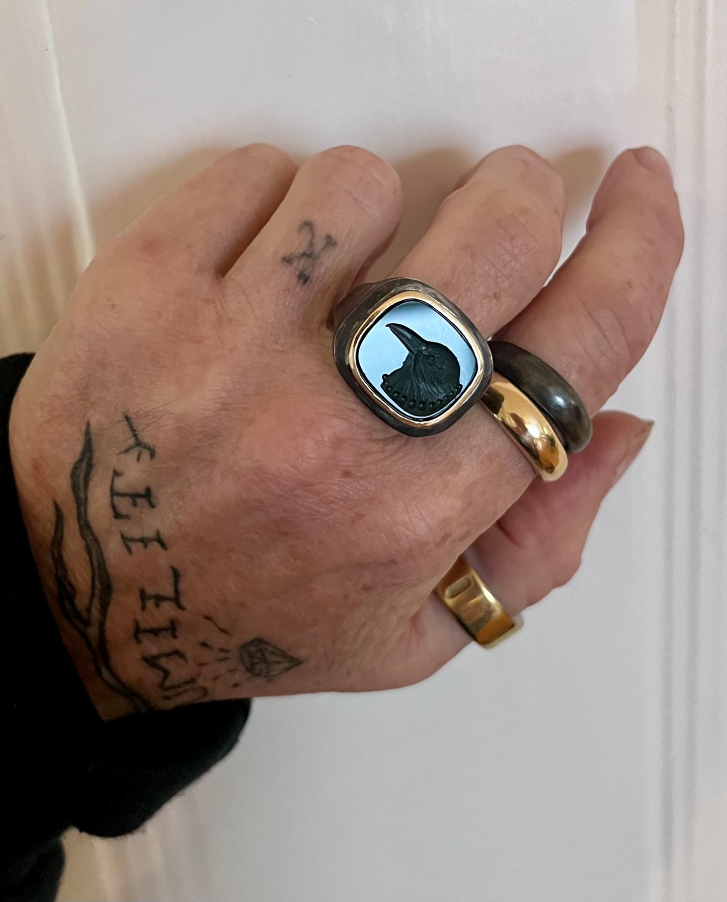 Oxidized silver and 18 K crow ring