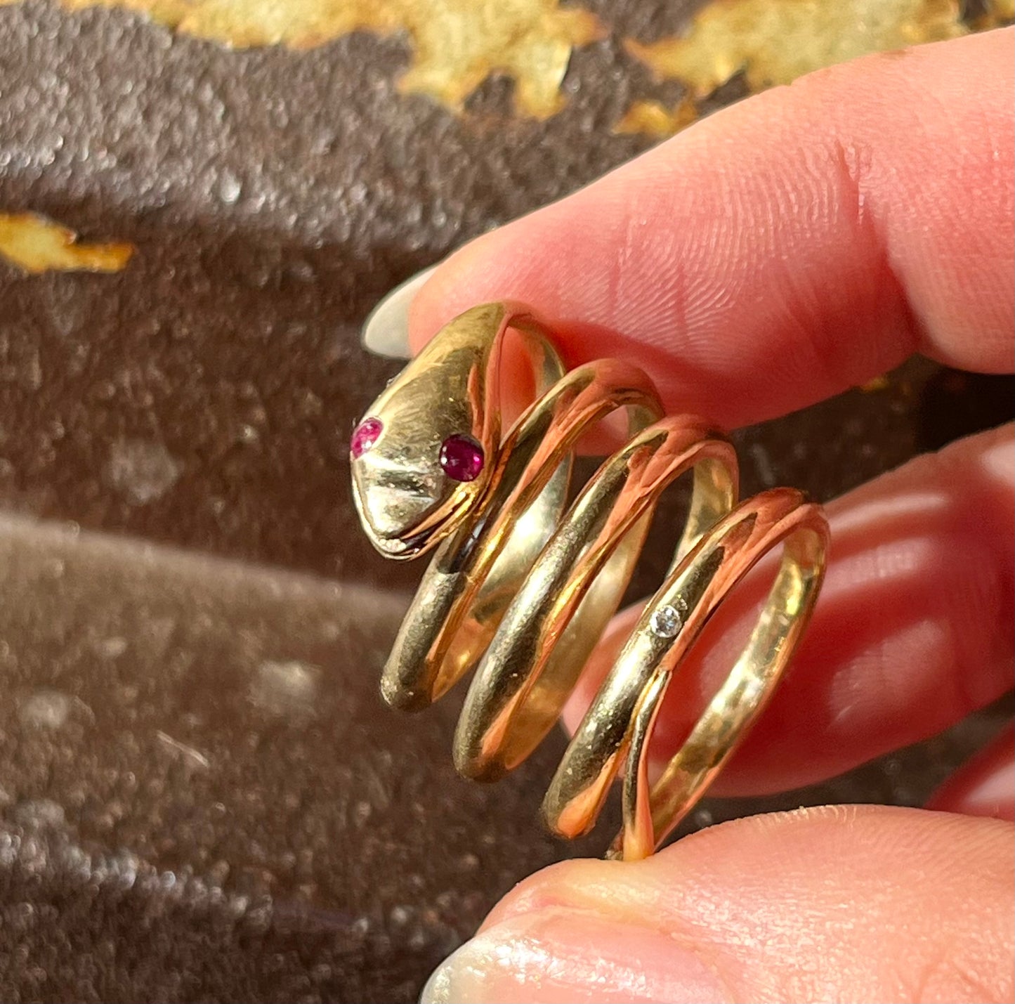 Snake ring with ruby eyes