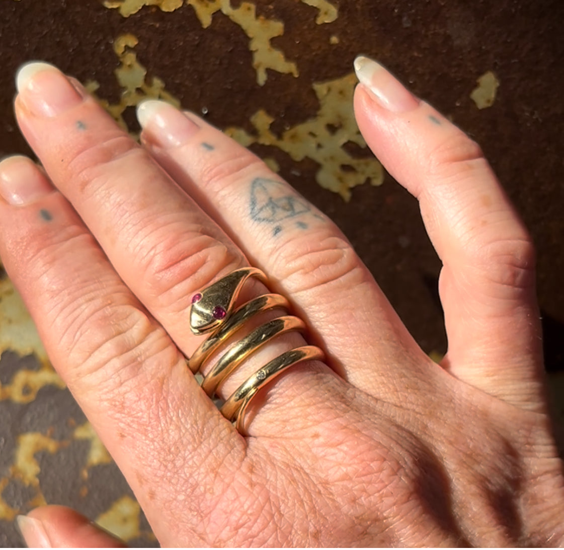 Snake ring with ruby eyes