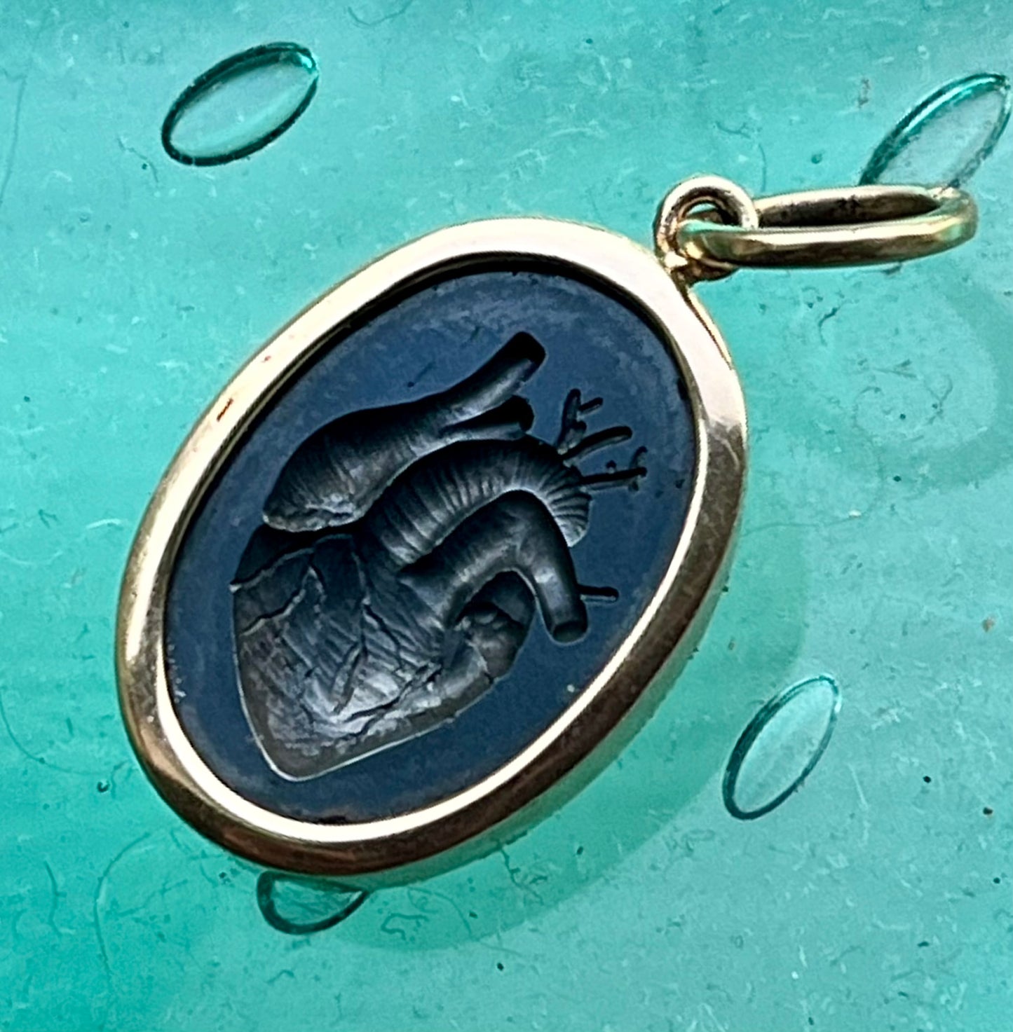 anatomical hematite heart pendant