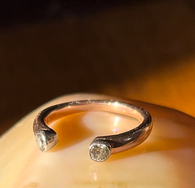 Rose gold open diamond ended band and a good story