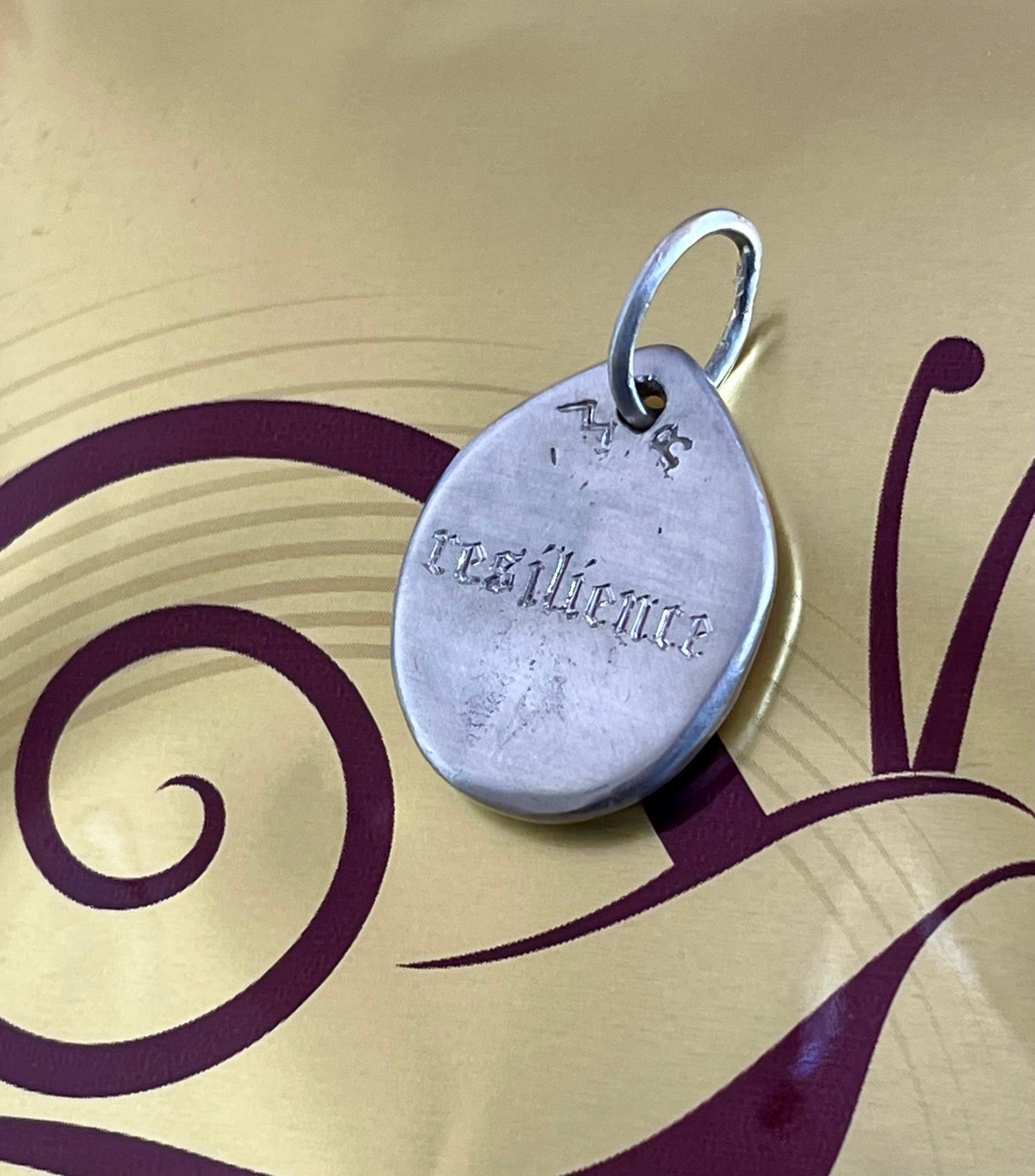 Silver snail pendant
