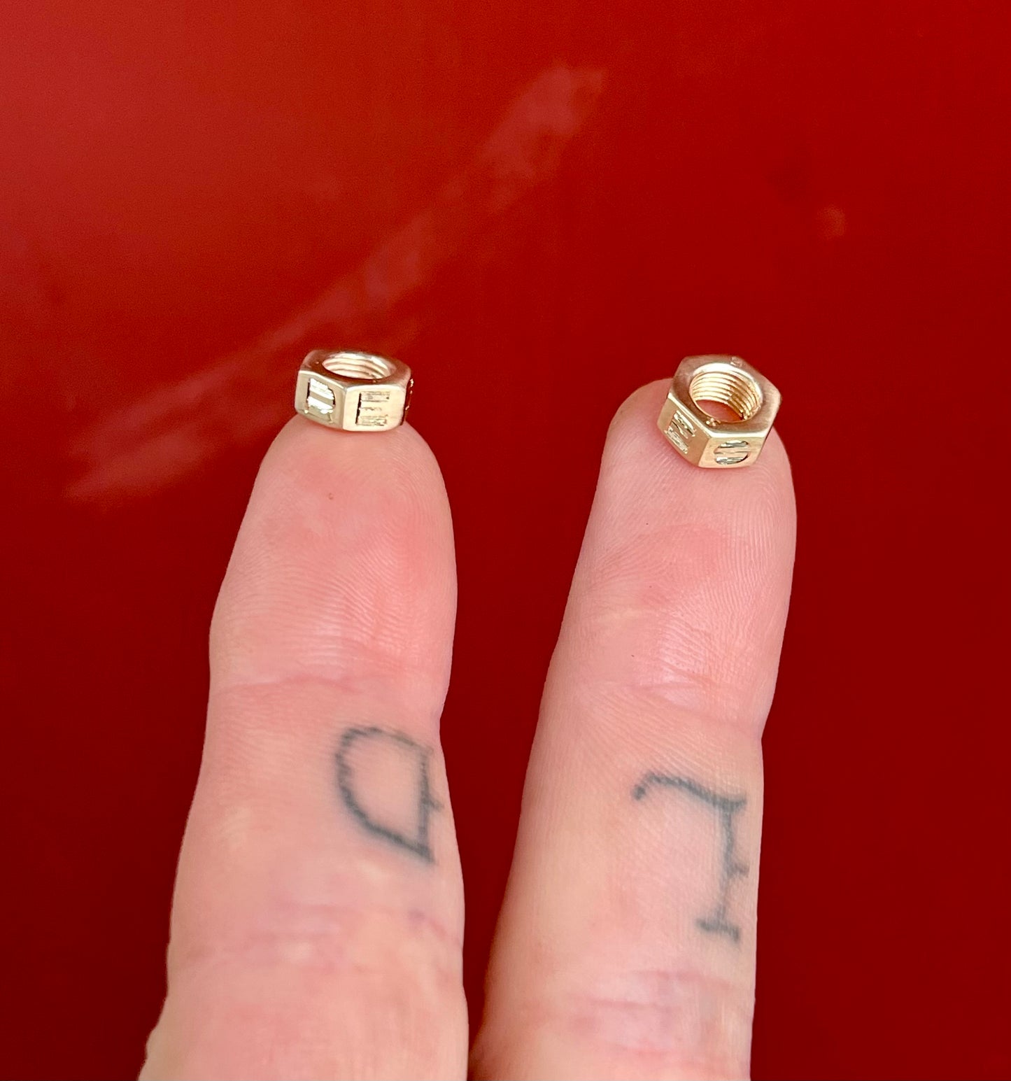 "RESIST" 14k mini nut