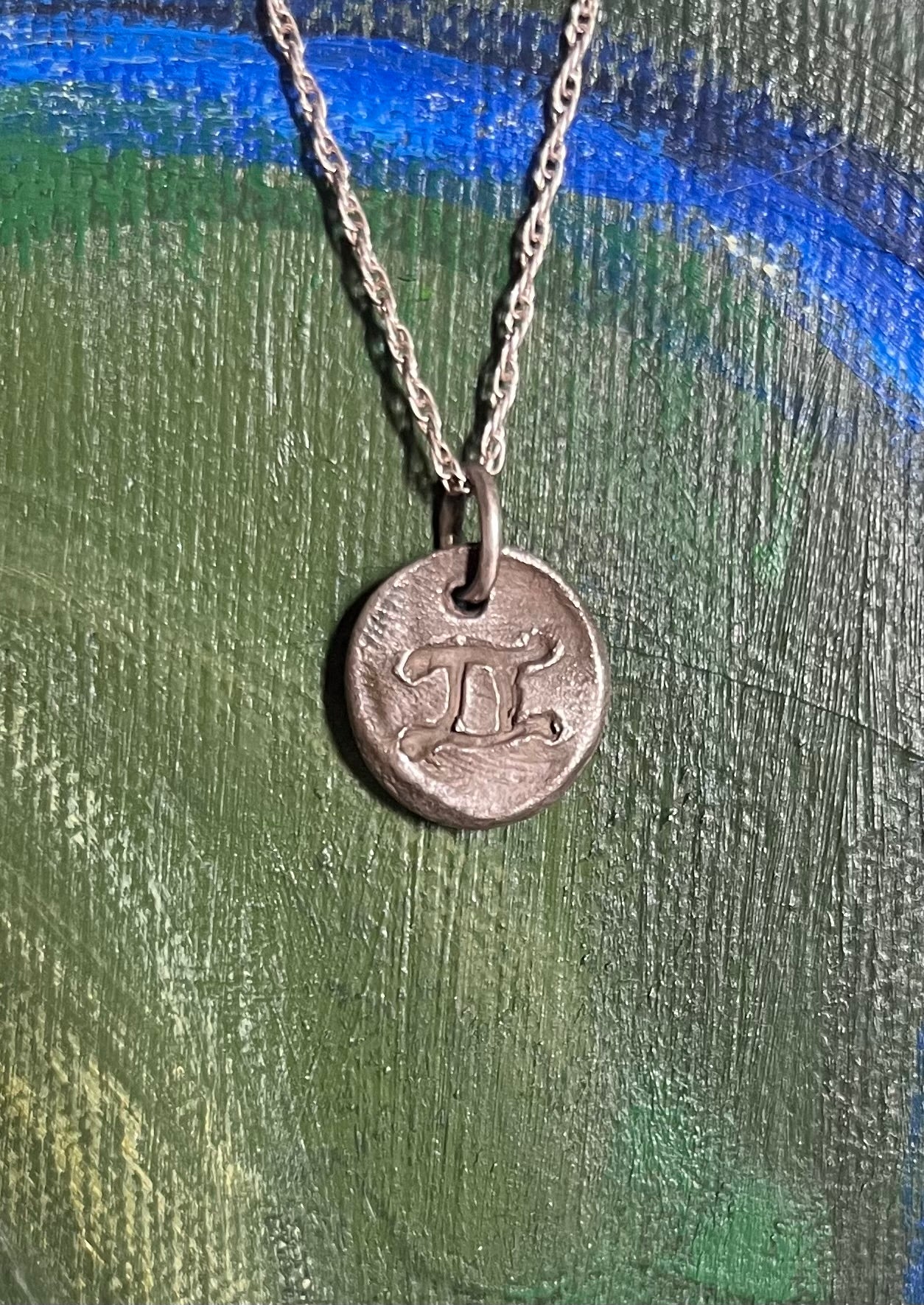 Blackened silver custom Gemini pendant