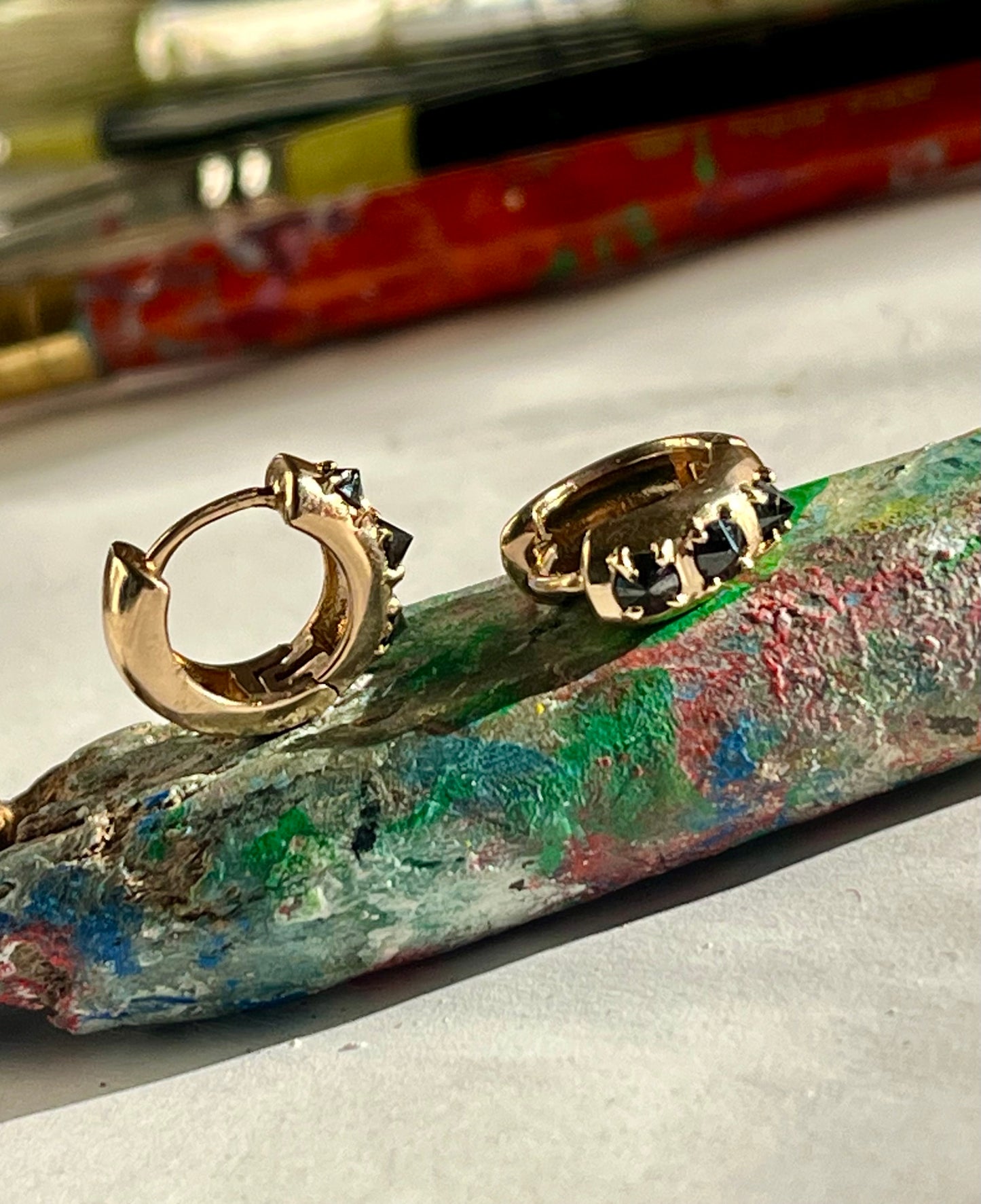 14k huggies set with black diamonds: bottoms up