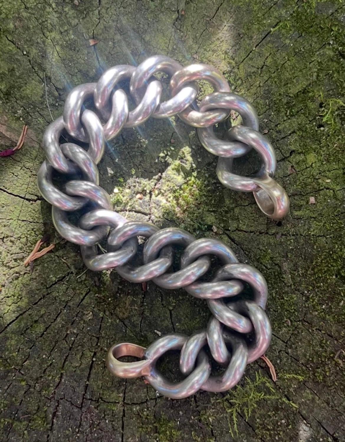 Mega curb bracelet with a gold link