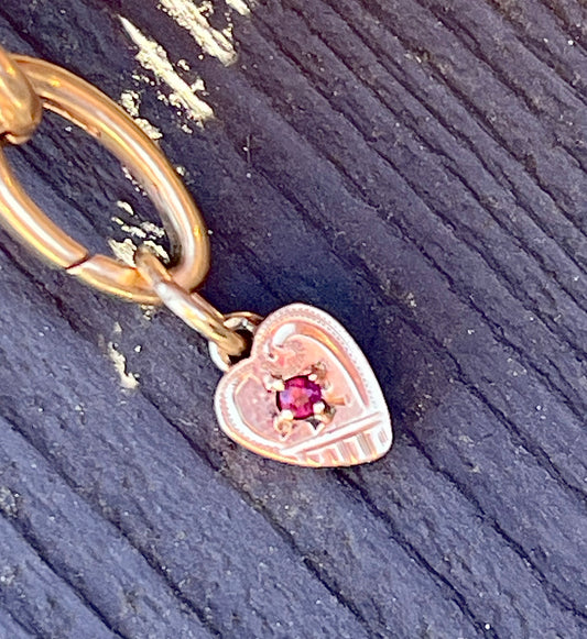 Tiny heart charm