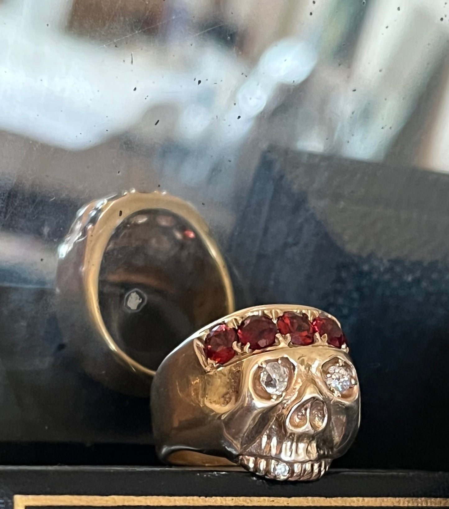 Gold Skull with old cut diamonds and garnets