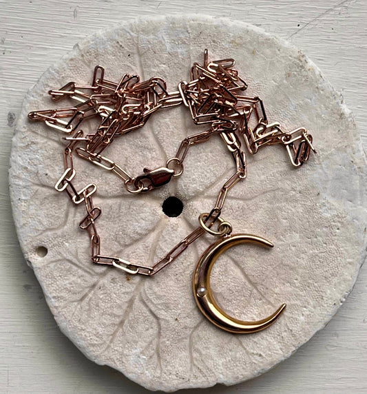 Crescent charm