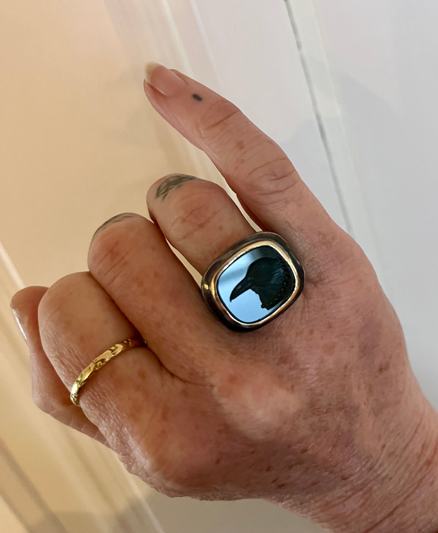 Oxidized silver and 18 K crow ring