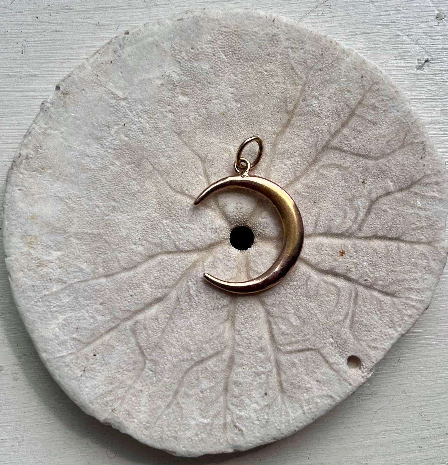 Crescent charm