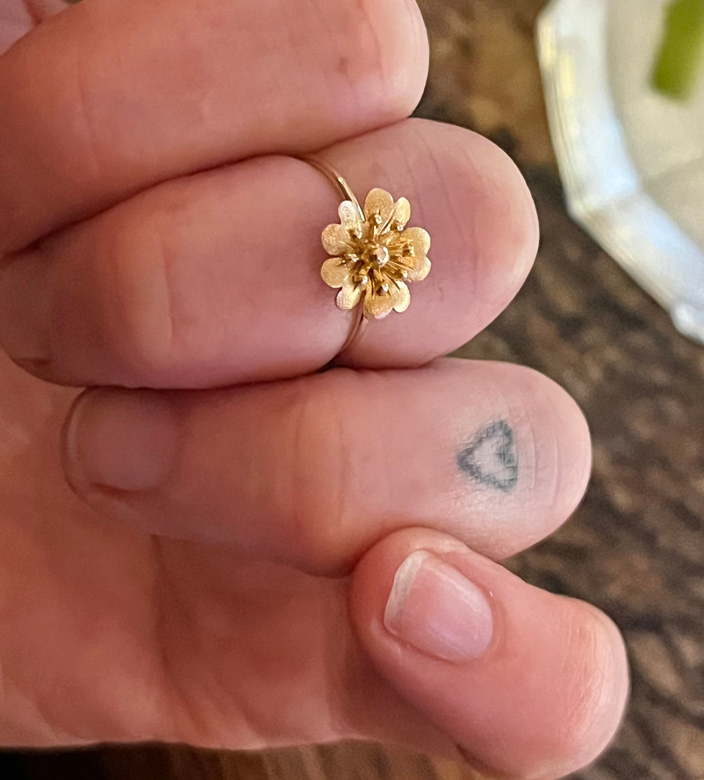 flower stickpin conversion ring.