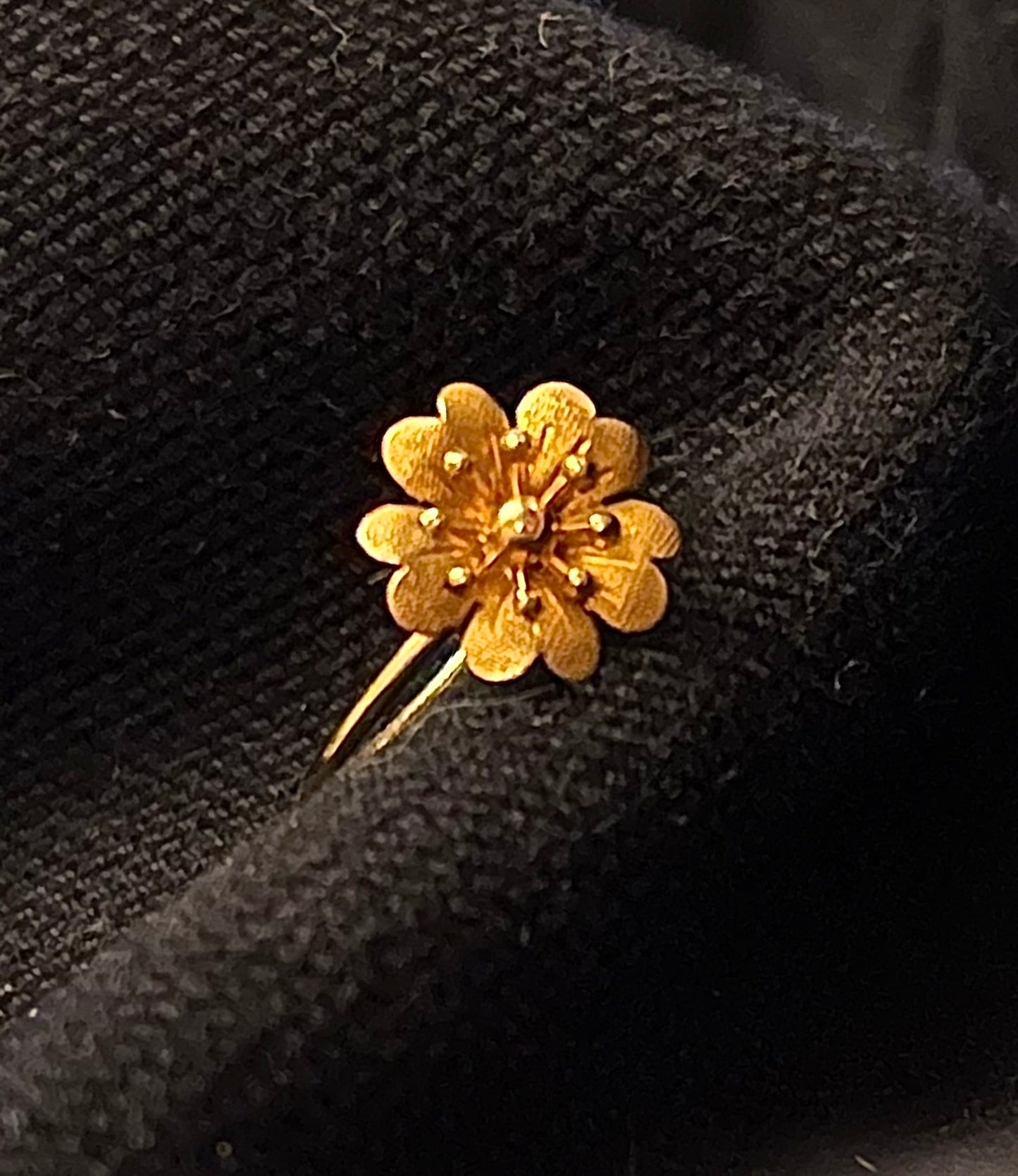 flower stickpin conversion ring.