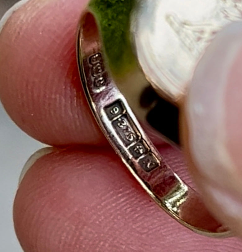 crown-wearing lion signet ring