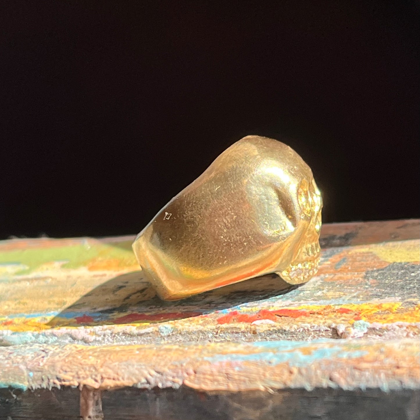 18k skull ring with diamond teeth