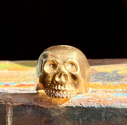 18k skull ring with diamond teeth