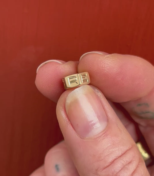 "RESIST" 14k mini nut